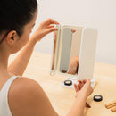 Espejo de Maquillaje Tríptico Recargable con Aumento y Luz LED